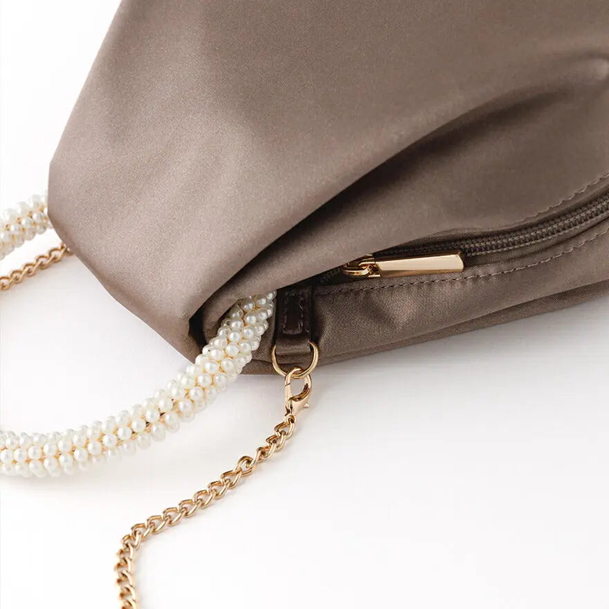 【3%OFFクーポンで10456円】リングハンドル刺繍巾着バッグパーティーバッグ結婚式バッグレディース春夏お呼ばれ/パーティ/リボン/オーガンジー/キラキラ/ビーズ/2WAY